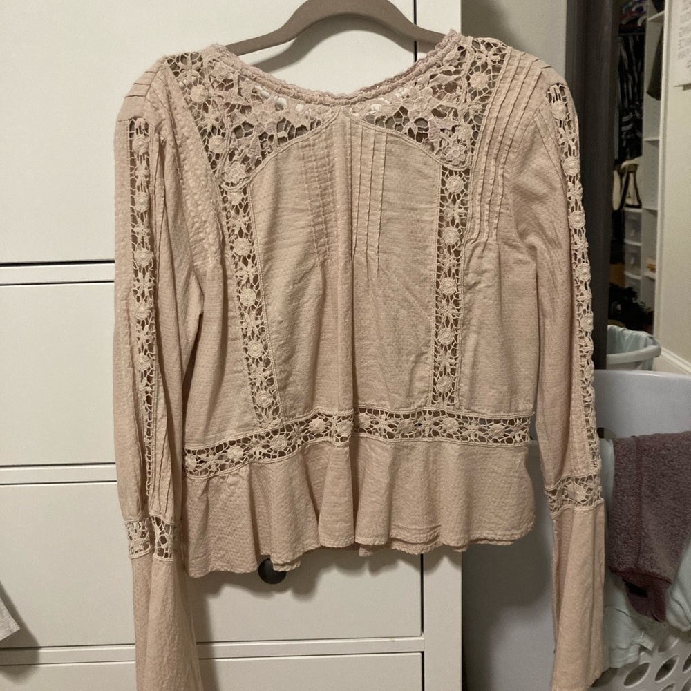 Free people beige long sleeve detailed top! Size M